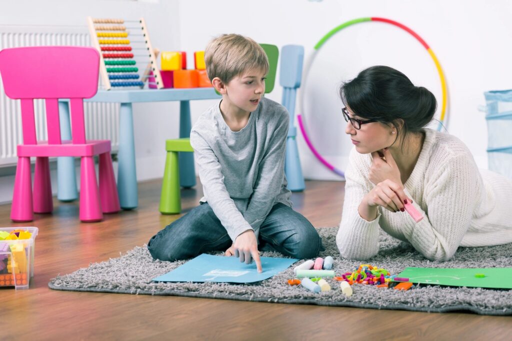 mother talking to child about divorce.